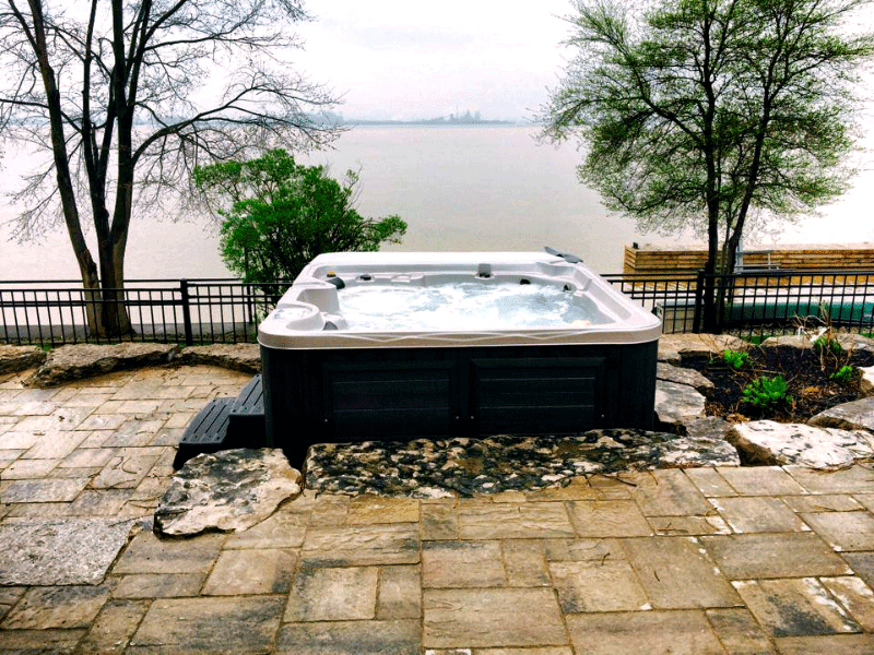Arctic Spas Hot tub in the backyard overlook the lake